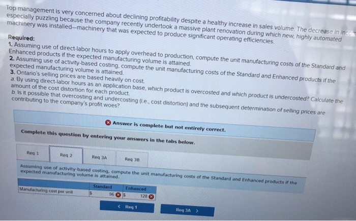 Inc., manufactures two products, Standard and Enhanced, and applies overhead on the