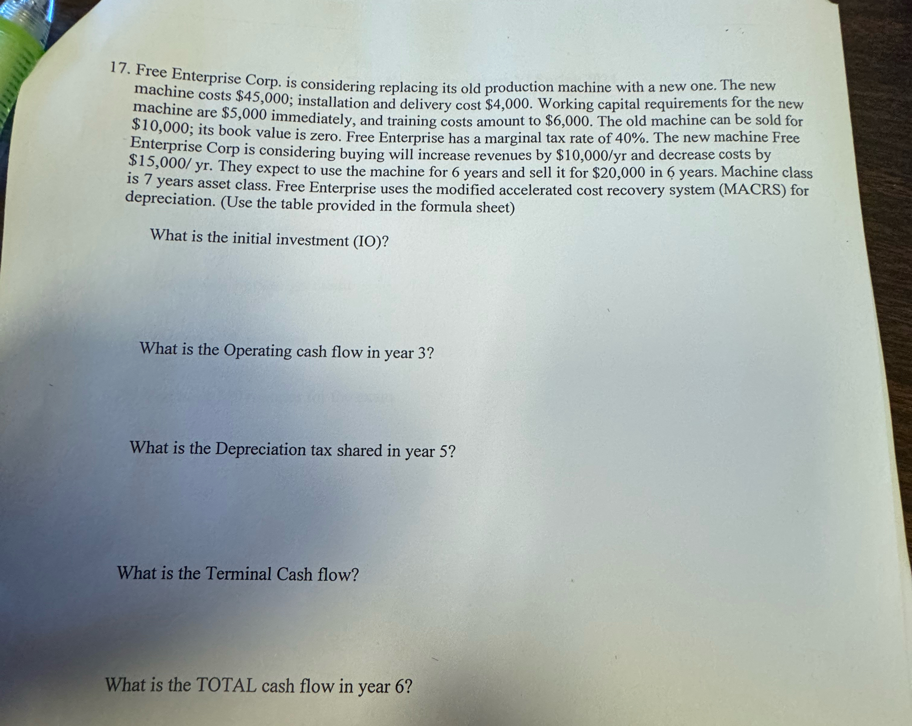  Free Enterprise Corp. is considering replacing its old production machine with