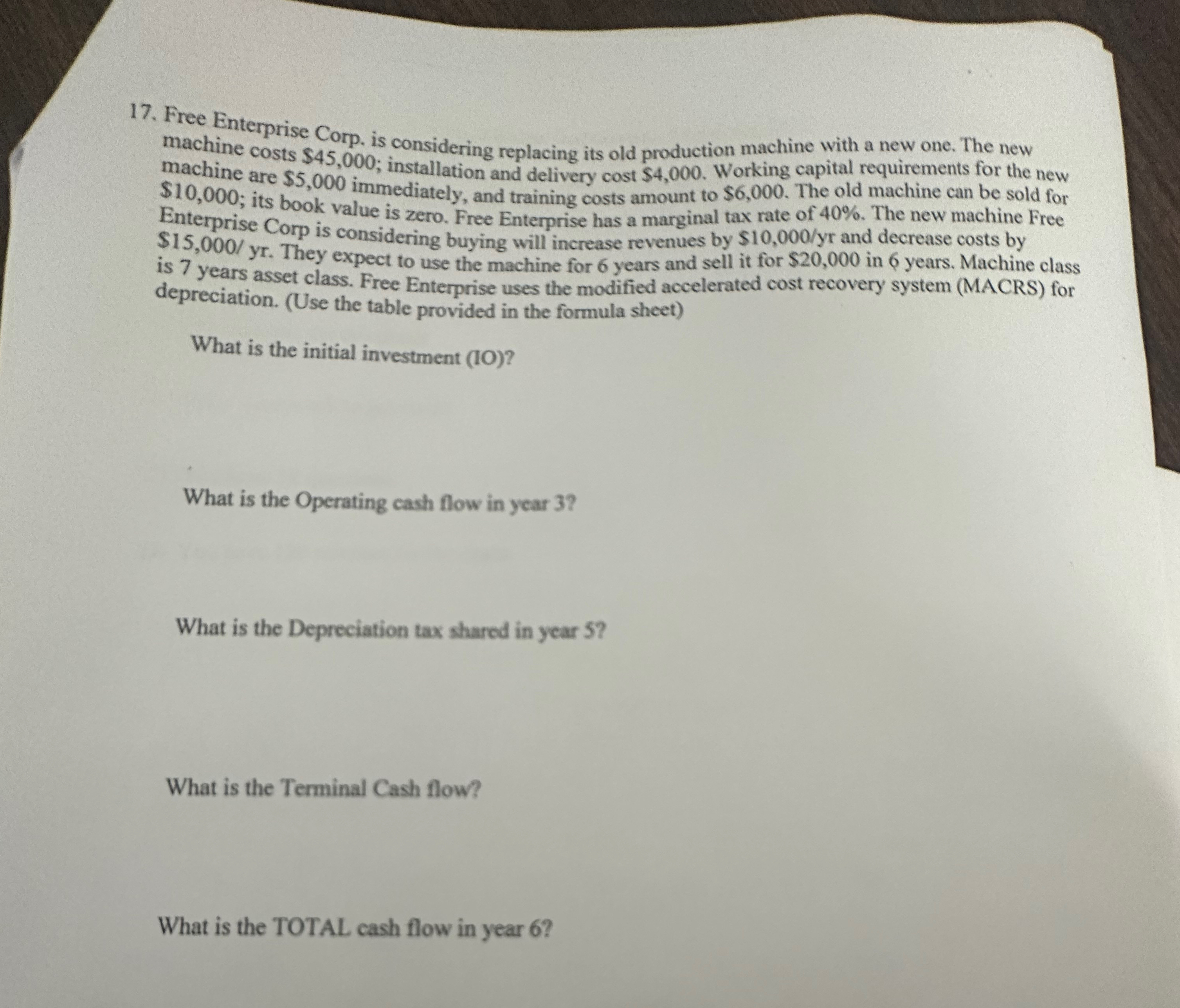  Free Enterprise Corp, is considering replacing its old production machine with