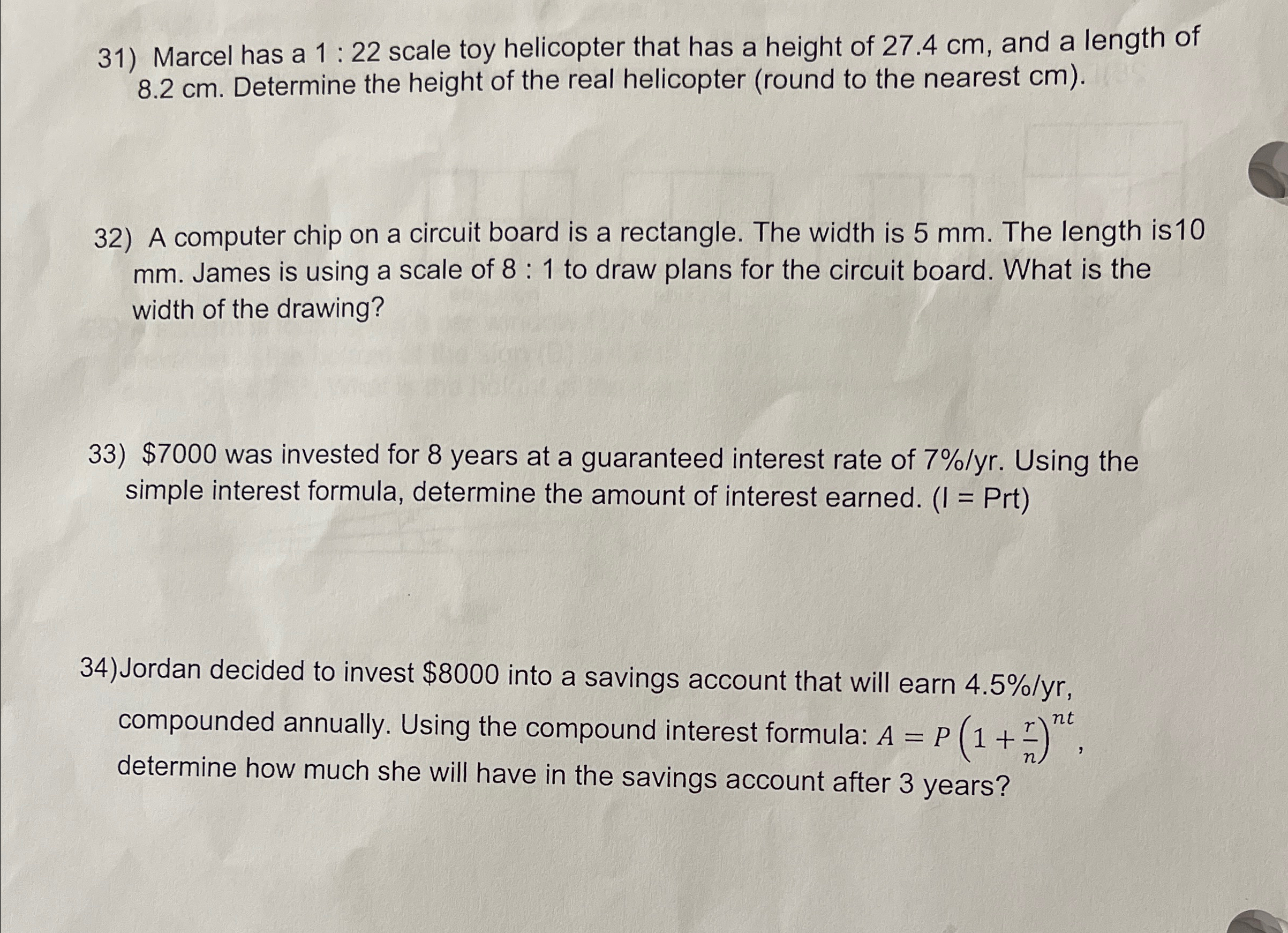  Marcel has a 1:22 scale toy helicopter that has a height