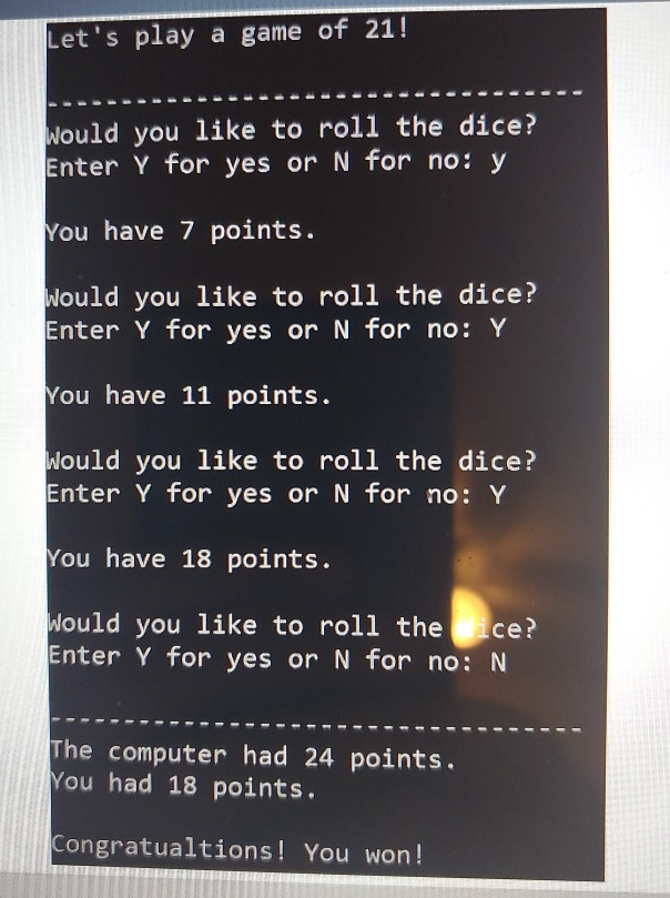 rolled, and the player tries to beat the computer's hidden total without