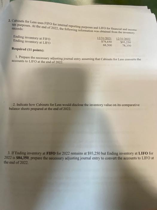  2. Cabinets for Less uses FIFO for internal reporting purposes and