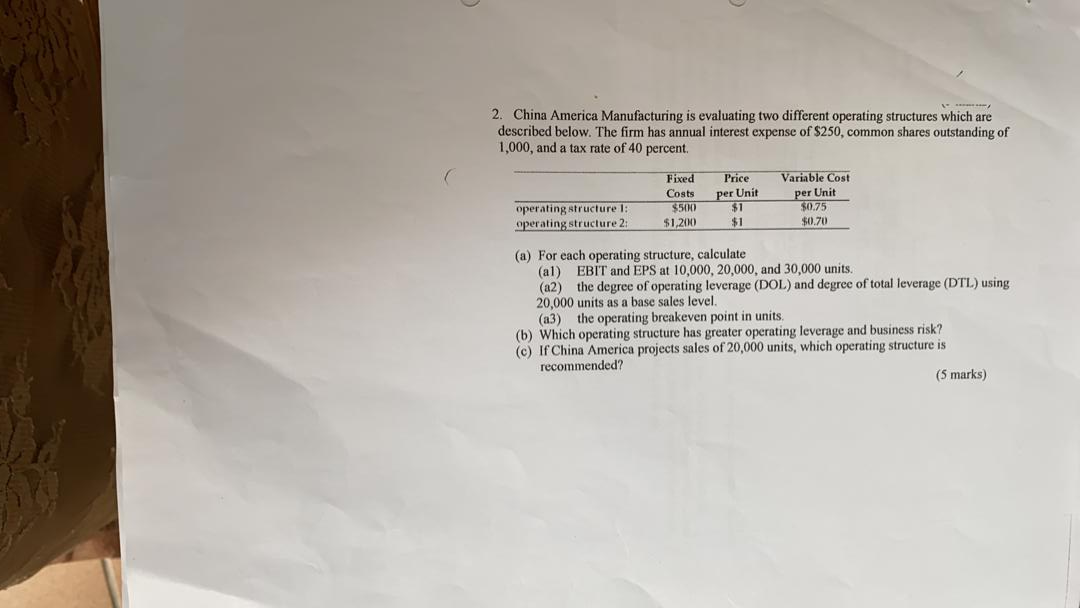 2. China America Manufacturing is evaluating two different operating structures which