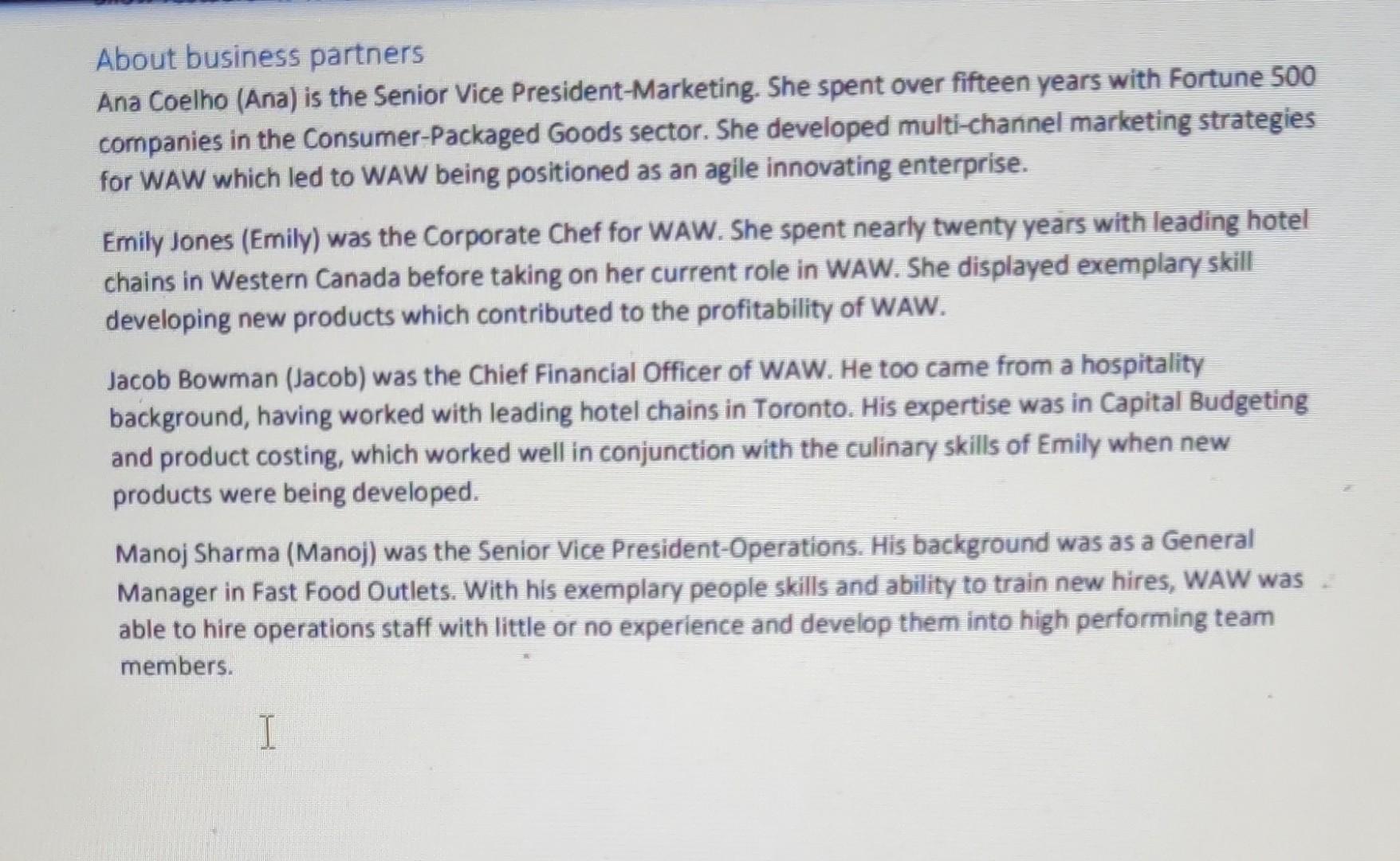 four business partners gathered together for a strategy session for their organization: