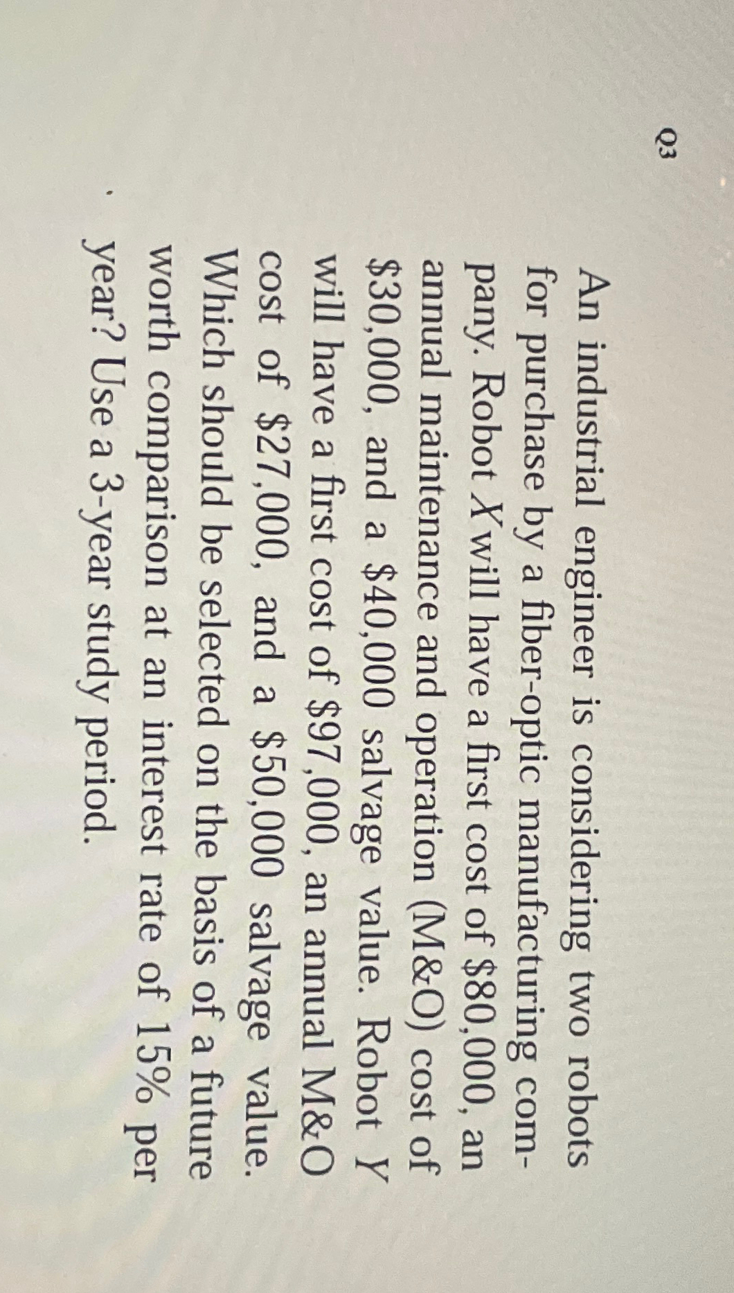  Q3 An industrial engineer is considering two robots for purchase by