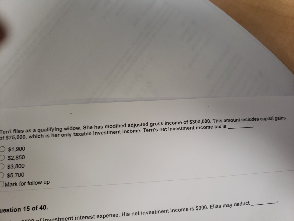 Terri files as a qualifying widow. She has modified adjusted gross