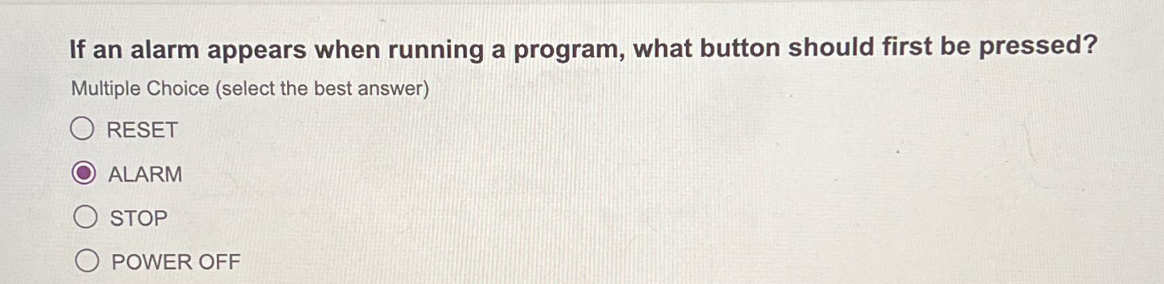  If an alarm appears when running a program, what button should