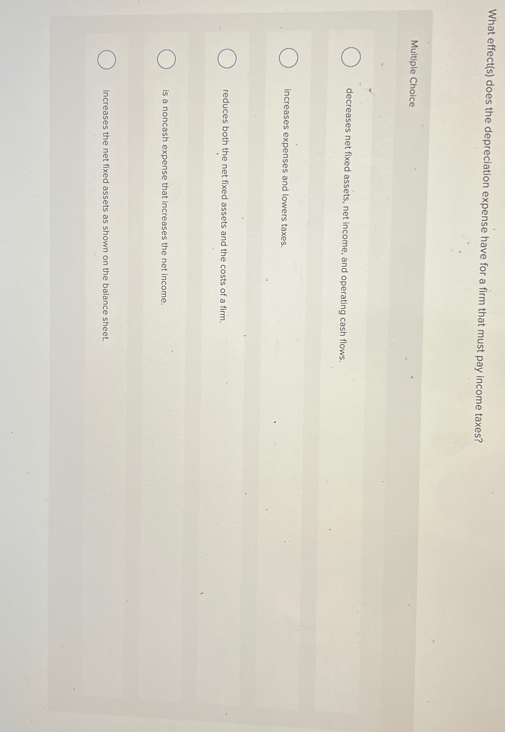  What effect(s) does the depreciation expense have for a firm that