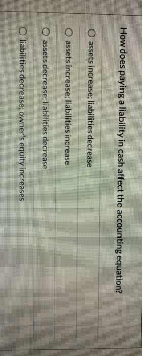  How does paying a liability in cash affect the accounting equation?
