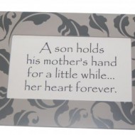 A on holds his mother's hand for a little while... her heart forever