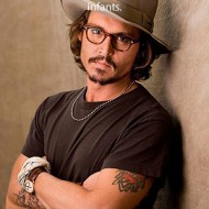 The only creatures that are evolved enough to convey pure love - Johnny Depp