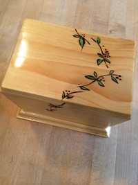 Lovely leaves carved into the urn by Chase & Sue Burritt of Fort Pierce, Florida