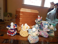 Ed Holstien's Urn and his mother - in - laws little Angels