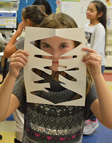 Third-grader Alivia Walker shows her shape