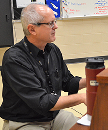 Chuck Detrich plays piano for the class and helps boys find various vocal ranges