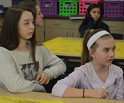 From left, Sophia Becker and Abbie Westers participate in talking about books