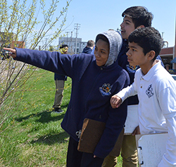 UPrep students (left to right) Jarese Jones, David Lopez and Anthony Leon check out a natural urban woodland. “I’ve learned to be respectful of nature and what God gave us,” Jarese said