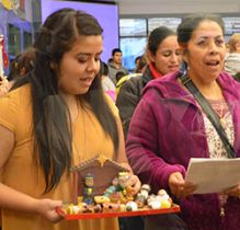 Inside the media center-turned-inn, parents answer the pleas of Mary and Joseph for a place to stay