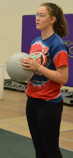 Alissa Richardson, a Forest Hills Central High School sophomore, gets ready to add a ball to the competition floor