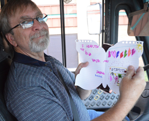 “I love you, Mr. Dave. Thank you,” reads a card to Dave Smith from a student named Delilah