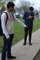 Christopher Jaime and John Perez identify spots for sunlight and shade