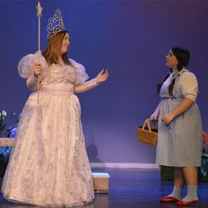 Dorothy, played by Aubrianna Ensley, meets Glinda the Good Witch of the North, played by Abi Garza, in the Cedar Springs High School production