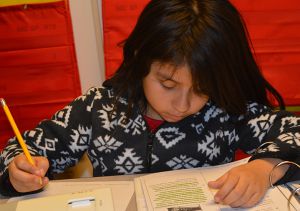 Jennifer Ramirez works on her reading