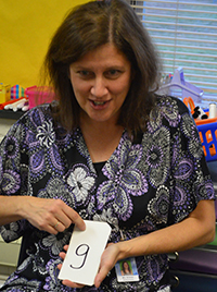 West Kelloggsville Reading Intervention Specialist Suzanne Schmier uses many different methods and tools to teach reading