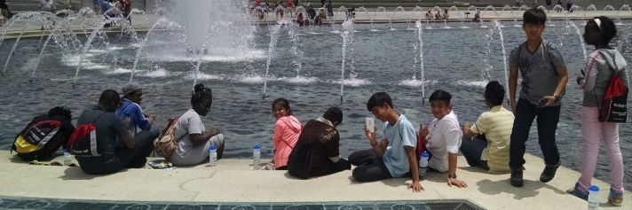 Students rest while touring