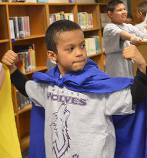 Sam Solis shows his superhero muscles