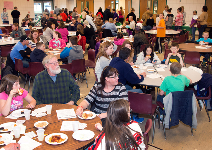 Families noshed on pizza and marked their bingo boards with cheerios