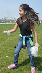 Jasmin Cruz hurries to clean up