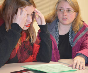 Dual-enrollment English? Accounting? Speech? Ladies Ensemble? Junior Gwen Hackett and her mother, Christy Baldwin, discuss senior year class choices