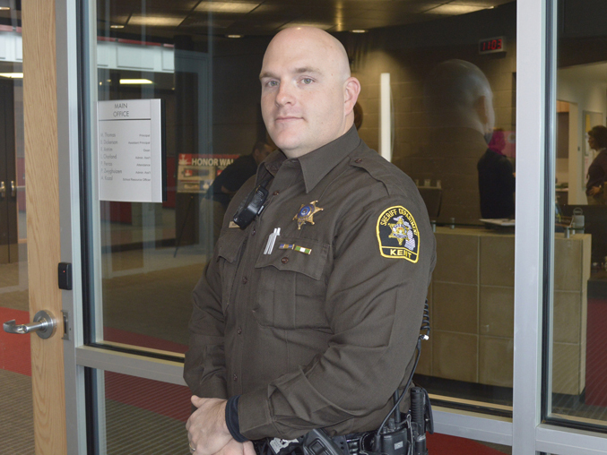 Northview school resource officer Deputy Andy Kozal stands in the security vestibule of Northview High School, one of many Kent County schools that have poured millions into security upgrades (SNN file photo)