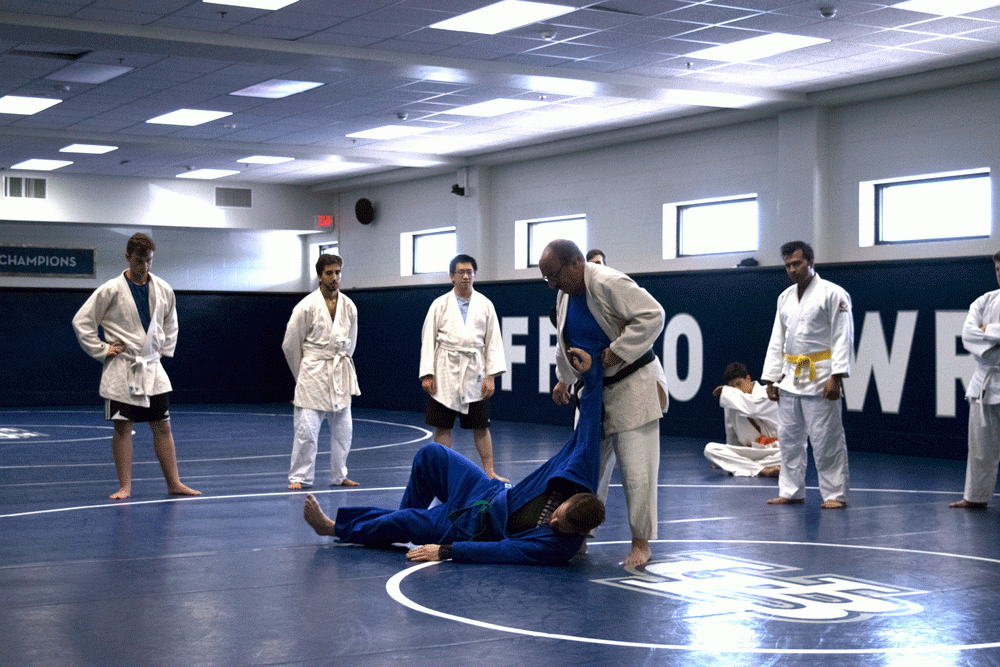 Sensei Alan Goldstein after a successful Judo toss. Goldstein is a Sensei at the UB judo club.