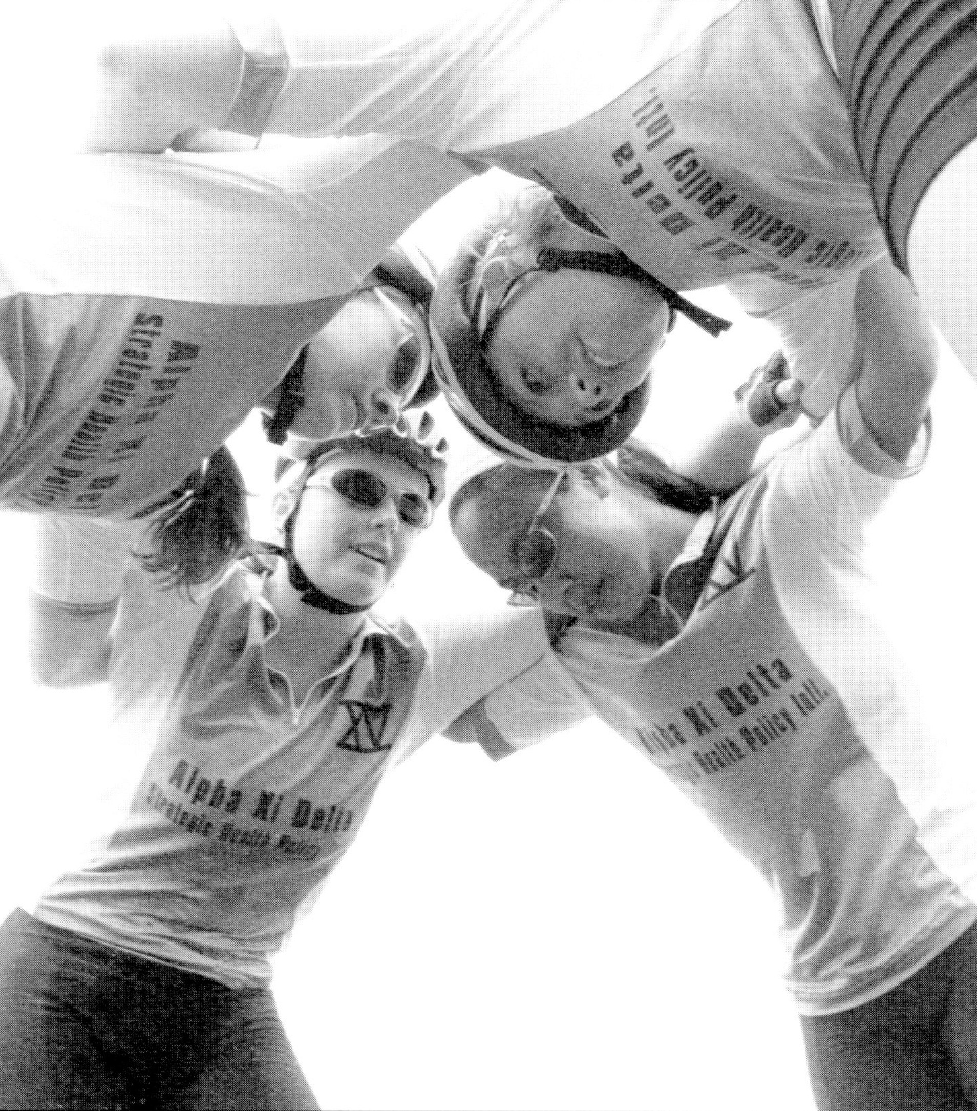 Alpha Xi Delta teammates huddle before the start of the women's Little 500 race in 2002.