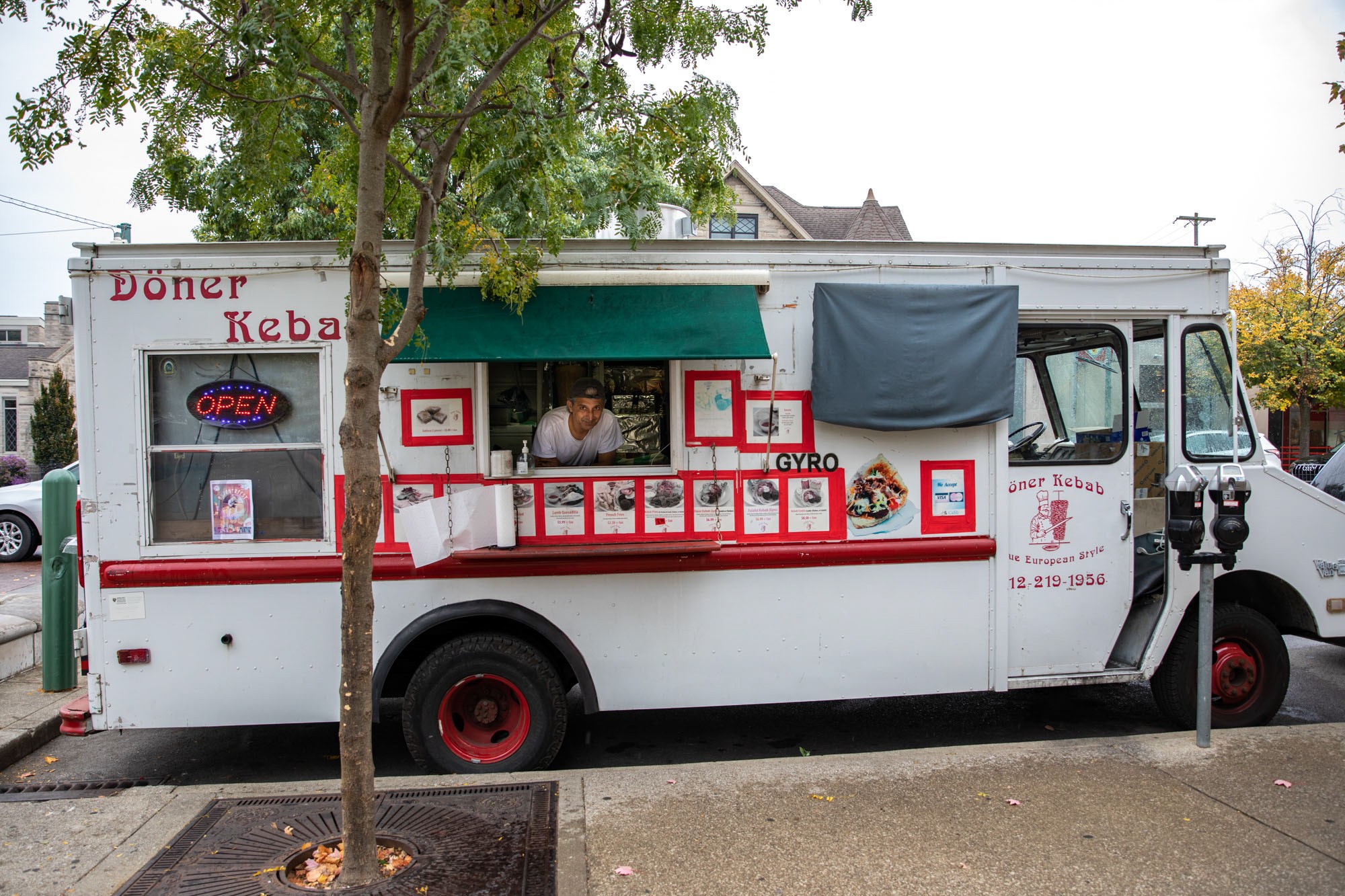 Hamid in his food truck named Doner Kebab.