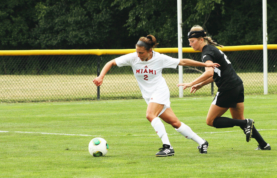 Sophomore midfielder Jenna Weiner dribbles past a Northern Kentucky defender during a 1-1 tie in an exhibition match on Aug. 17.  