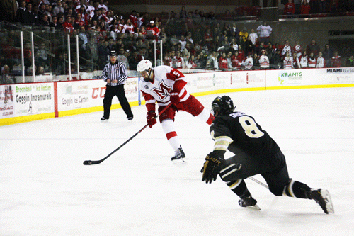 Miami sophomore defensman Chris Joyaux attemps a shot during Miami’s 3-2 loss to Western Michigan Feb. 8. 