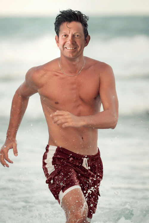 President David Hodge enjoys long jogs on the beach in Miami, Fla.