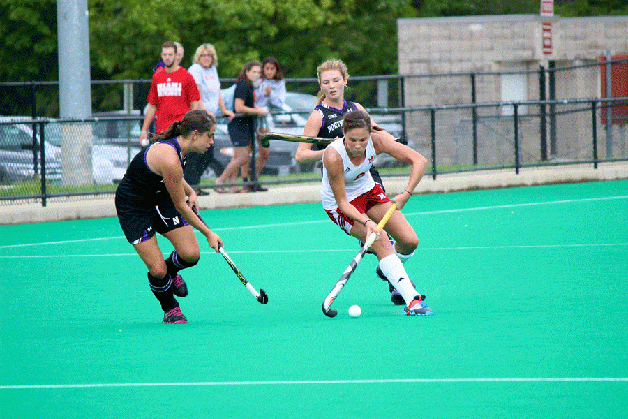 Miami sophomore midfielder/forward Geagy Pritchard attempts to get past a Northwestern defender during Miami’s 5-1 loss. 