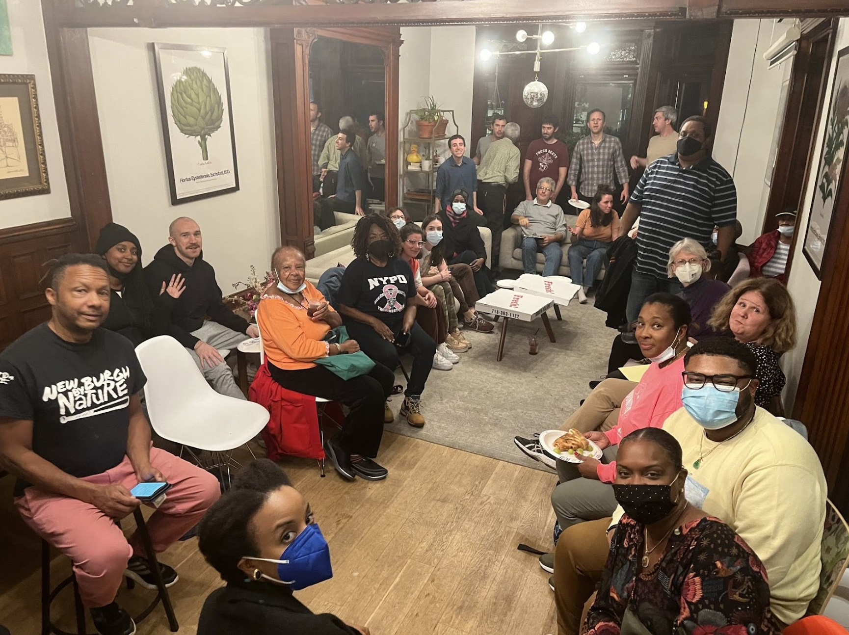  Francis’s neighbors at a community meeting. Photo courtesy the 900s Park Pl Block Association. 