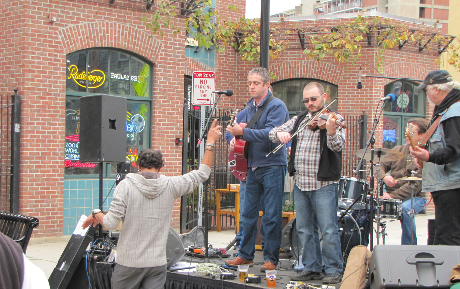 Musicians performing live on stage at SomerStreets