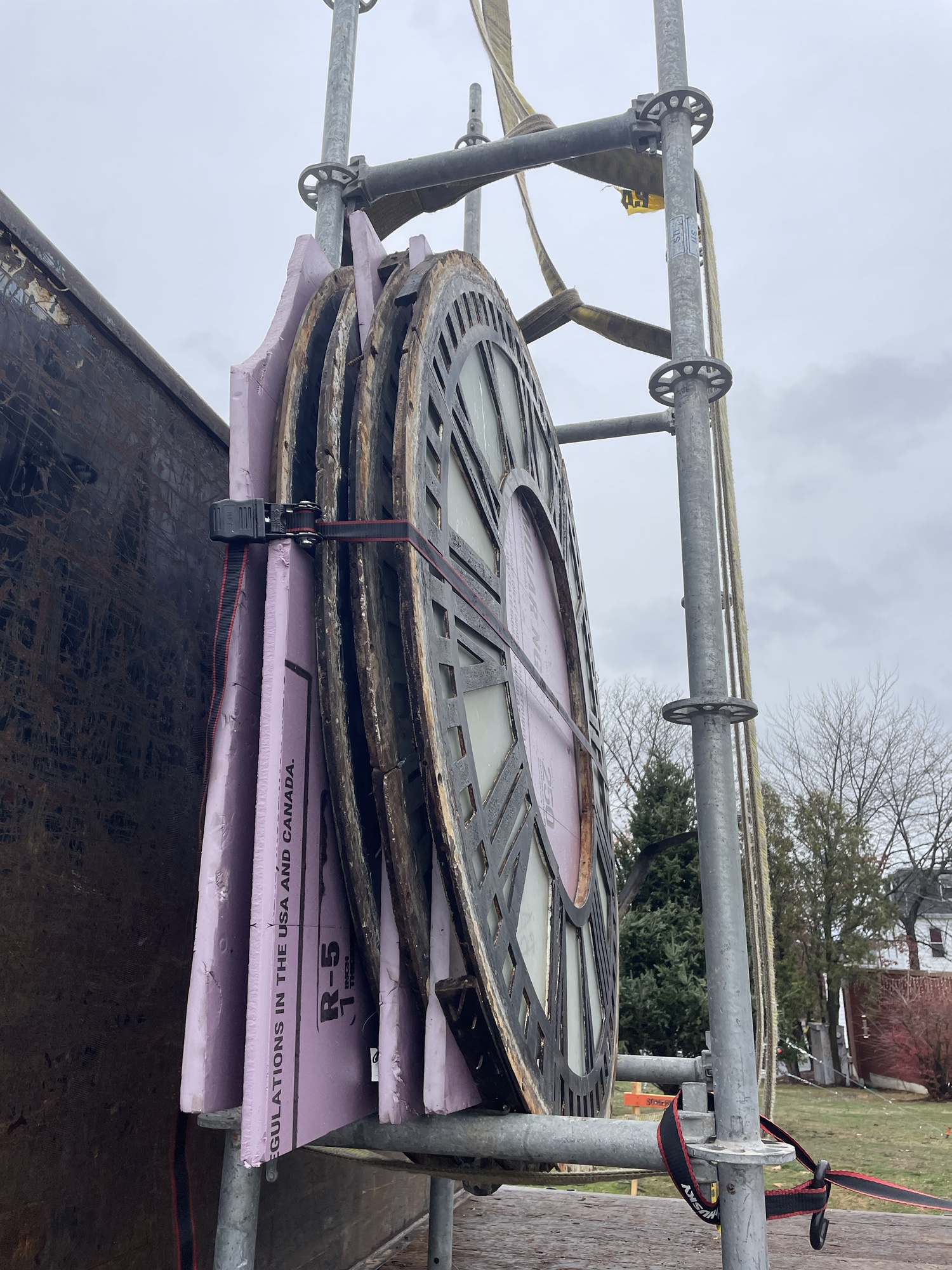 Clock faces on truck ready for transport