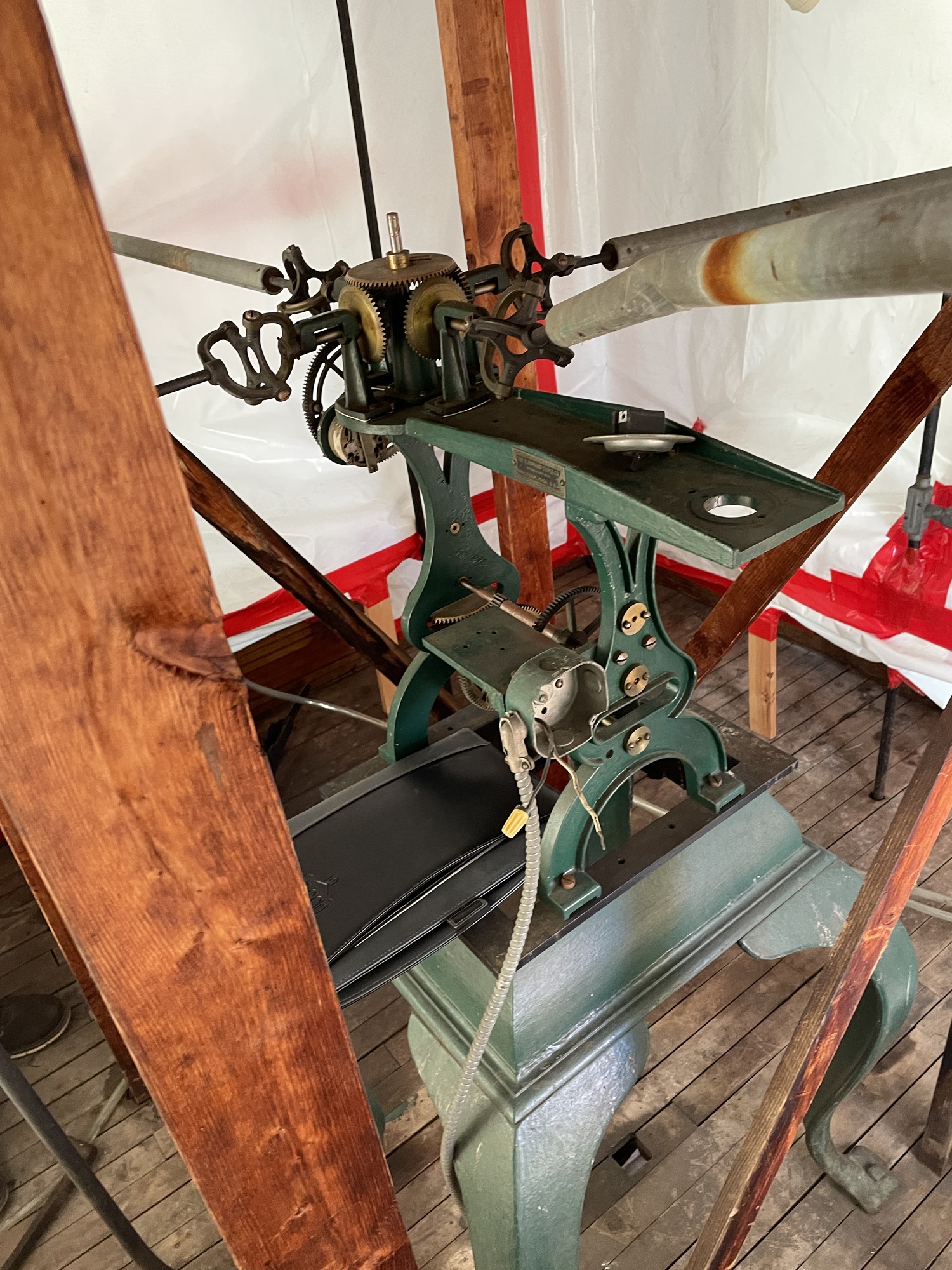 Interior of City Hall clock tower mechanism with multiple gears
