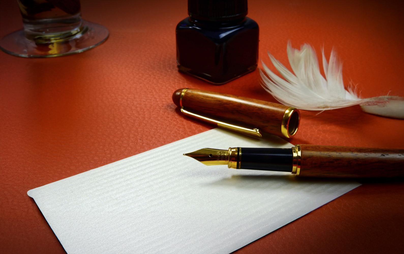 A fountain pen on a desk