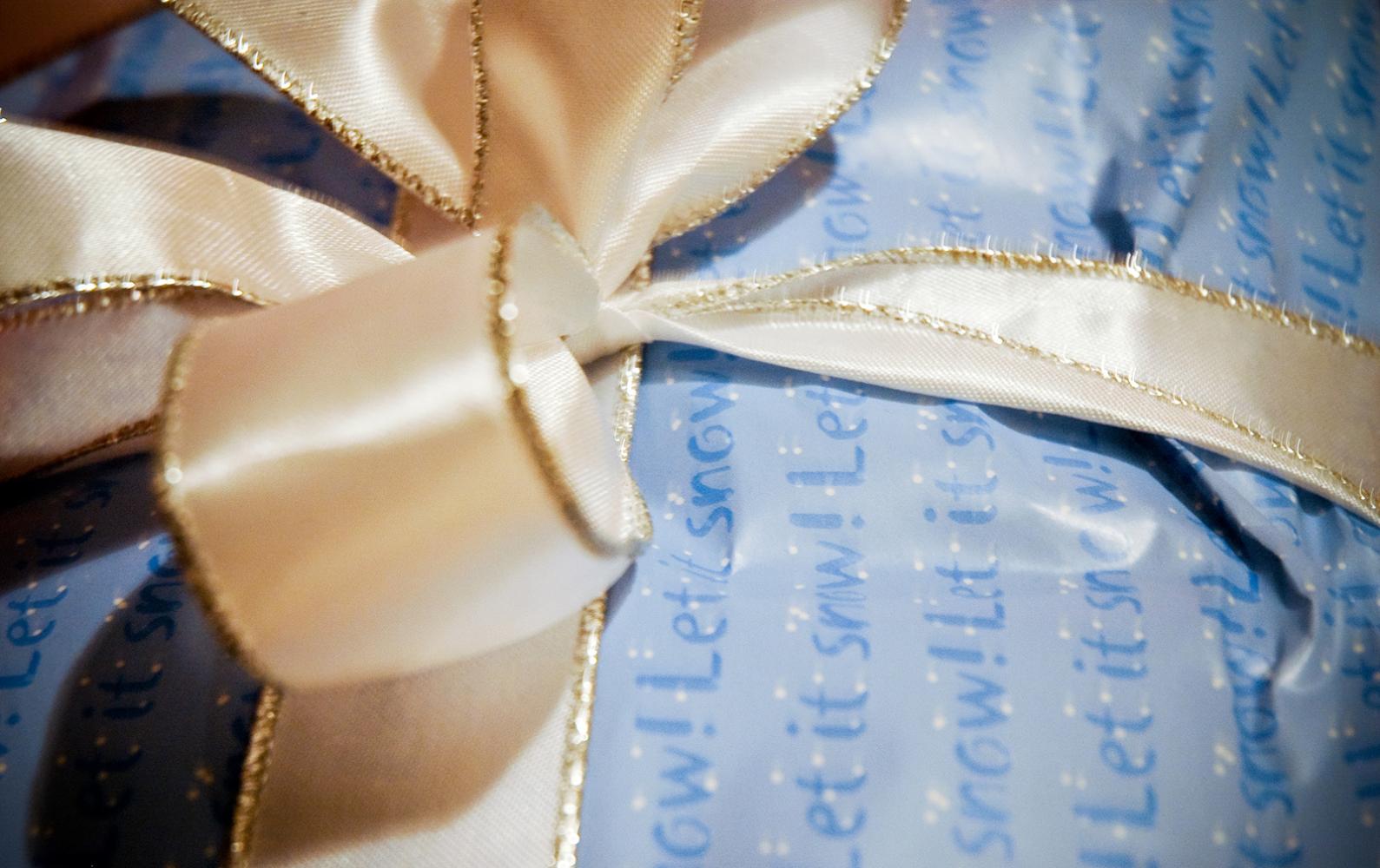 Holiday gift wrapped with a bow