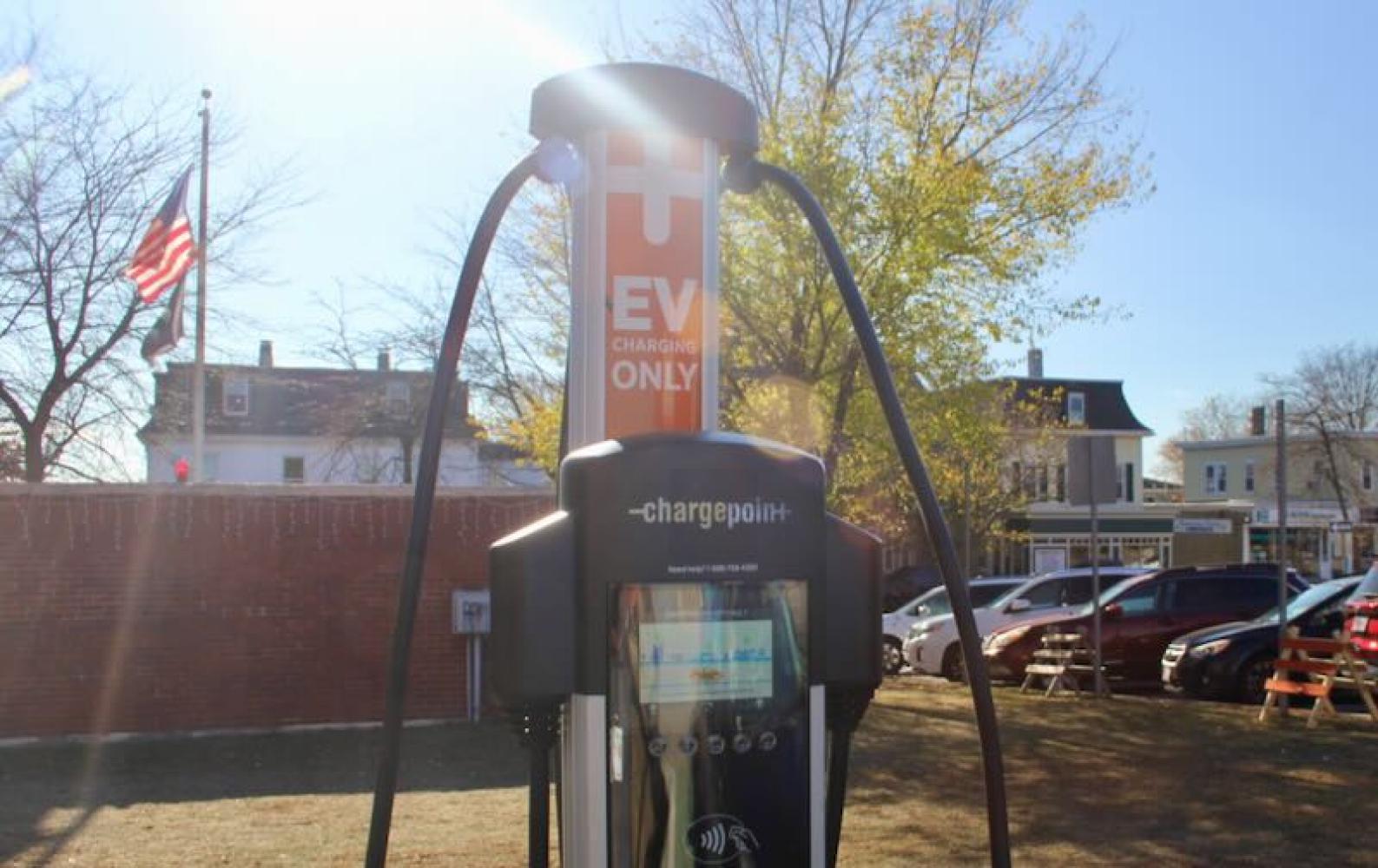 A closeup of an electric vehicle charging station outside City Hall in Somerville. 
