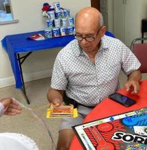 Somerville senior participating in games at the Council on Aging.