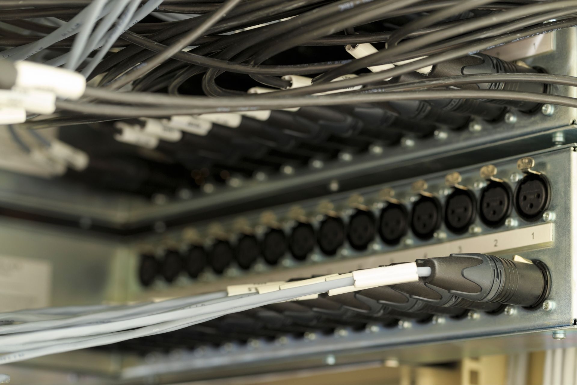 How can ambient noise level monitoring improve productivity in open office spaces?